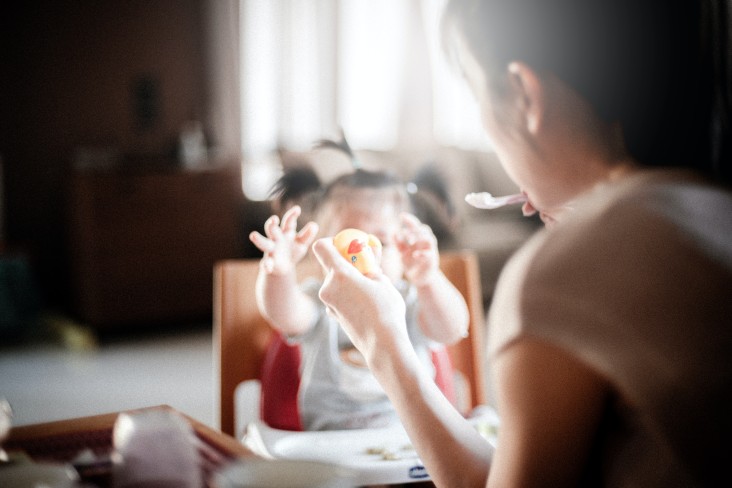 Mother and child having breakfast